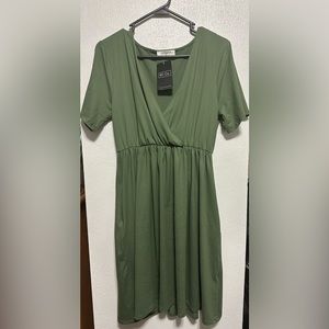 New Olive dress with tags from Ruby Claire Boutique